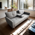 Nordisk 2-personers sovesofa i tekstil med kopholder armlæn Donum Kampagne