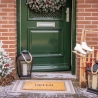 Indgangsmåtte i kokosfibre med teksten "Hello" Udvalg