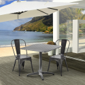 Caelum cafebord sæt: 2 farvede stole og 70x70 cm firkantet stål bord På Tilbud